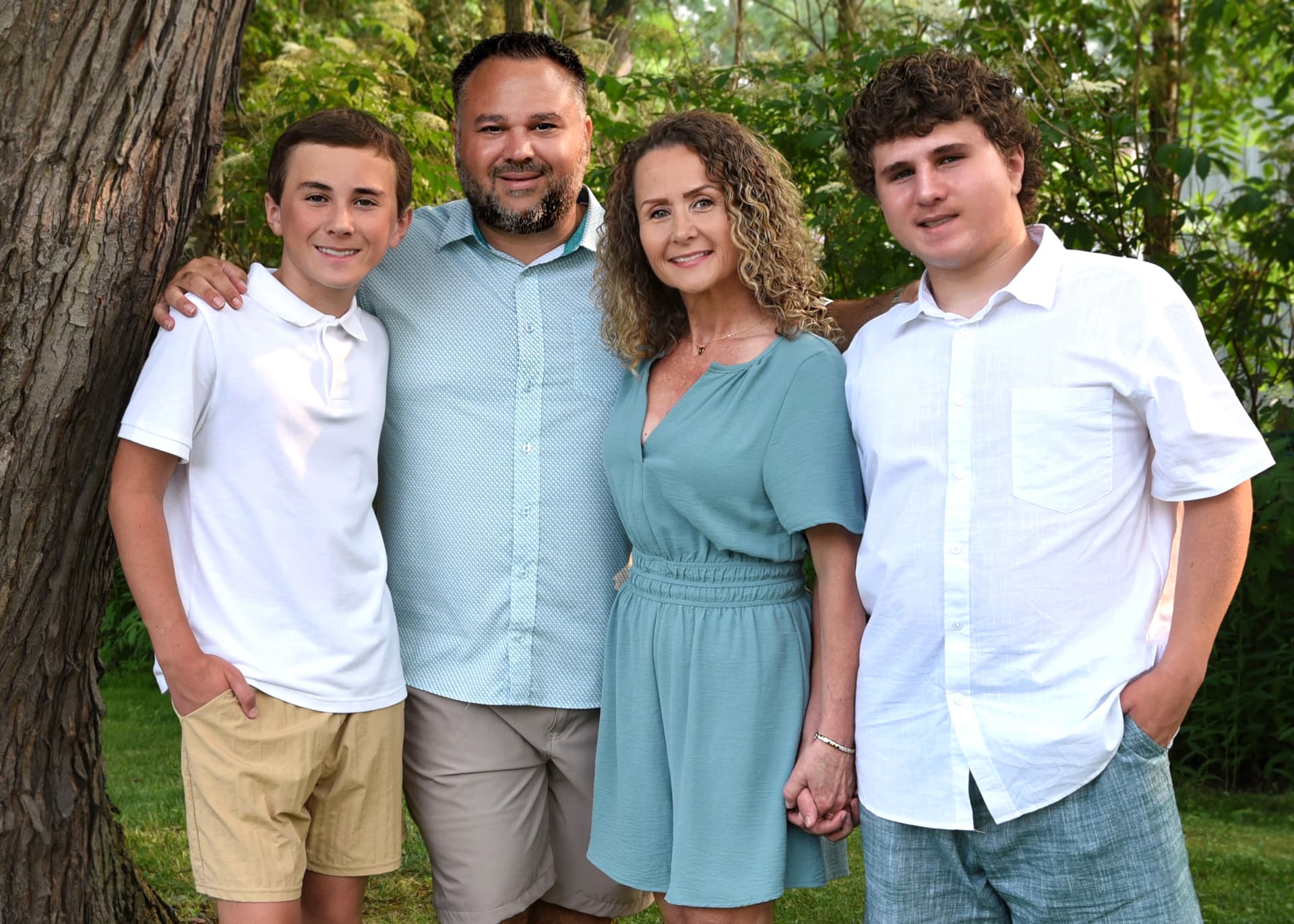 Doug Mooradian with his wife Jenn and their children in Niagara County